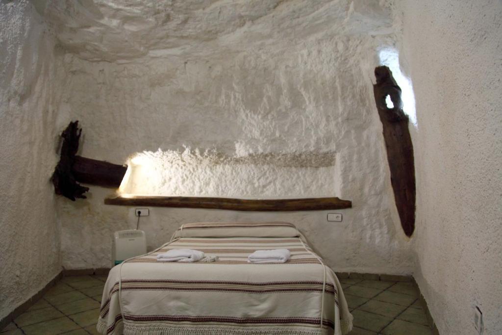 Апартаменты Cuevas La Atalaya Уэскар Номер фото