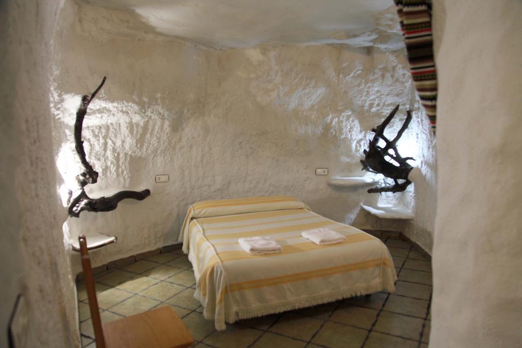 Апартаменты Cuevas La Atalaya Уэскар Номер фото